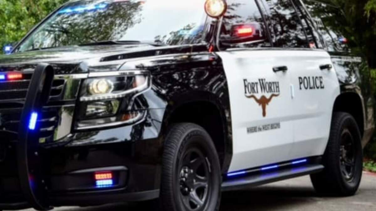 A woman was fatally struck by a vehicle early Friday, Sept. 4, while trying to cross Jacksboro Highway, Fort Worth police say. Black and white Fort Worth police SUV with red and blue police lights turned on.